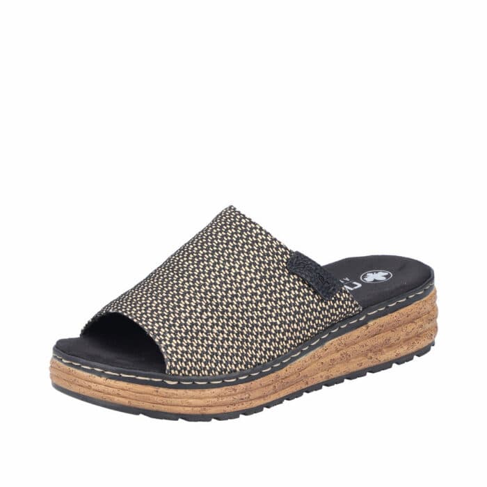 Rieker sandal til dame i sort med beige og glitrende mønster foran samt ekstra bredde H og plateausål på 4,5 cm